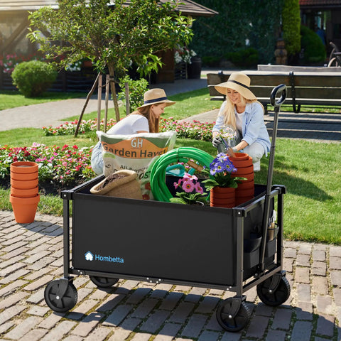 Heavy Duty Collapsible Wagon Cart With 29.3 Inch Body 150L Capacity And 260 Lb Load Beastly Rolling Cart For Garden Groceries Sports Gear Camping Black in use for gardening.