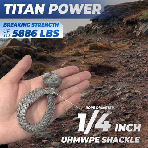 Hand holding UHMWPE D Ring Anchor Soft Shackle For Heavy Duty Marine Rigging And Recovery, rocky path background.