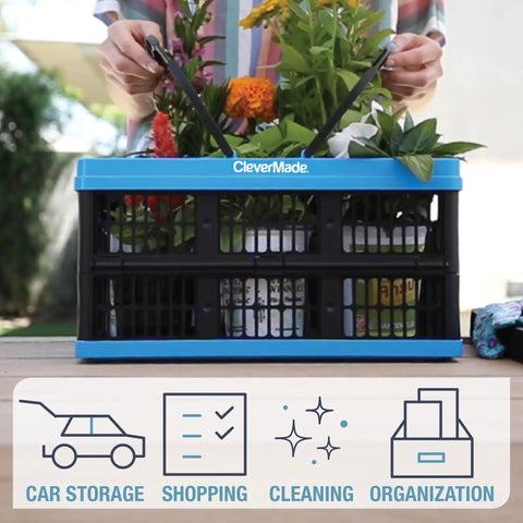 Collapsible Plastic Grocery Baskets Pack Of 3 With Handles in use for carrying groceries, Neptune Blue, by CleverMade.