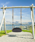 Heavy Duty Swing Seat For Adults And Kids With Weatherproof Ropes, Height Adjustable Tree Swing Accessory, Black, in scenic outdoor setting.