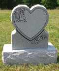 Heart Cemetery Memorial Headstone And Base With Two Design Options, Custom Engraved Gray Granite Upright Monument in grassy setting.