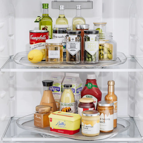 Lazy Susan Organizer For Refrigerator And Kitchen Turntable 14.56 Inch By 11 Inch Condiment Storage Fridge Organization Pantry Cabinet Countertop Organizer Grab And Go Rotating Shelf Requires Over 15.5 By 12 Inch Clearance showing condiments and bottles neatly arranged.