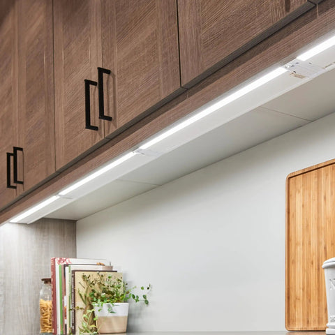 Kitchen view with 4U Series 30 Inch LED Under Cabinet Light 120V White 3000K Diffused Task Lighting, slim design under wood cabinets.