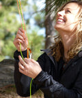 Person using Bear Bag Food Hanging System For Camping And Hiking With 2 To 1 Pulley waterproof ropes outdoors