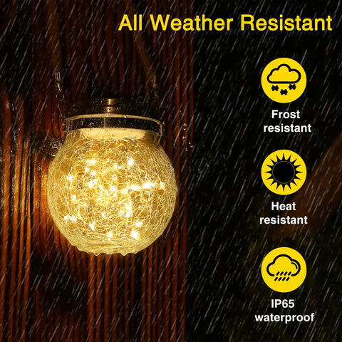 2 Pack Solar Lanterns With 30 LED Waterproof Garden Lights glowing in rain showing frost, heat, IP65 waterproof resistance