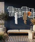 Slick Abstract Line Coat Rack Wall Mount With Integrated Key Holder Mid Century Modern Entryway Hooks For Jackets And Bags Fresh Black Metal Home Accent Vibe Solid Wall Storage Setup For Quick Daily Grabs, white coat rack with jackets and hat.
