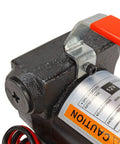 Close-up of 12V DC Portable Electric Fuel Transfer Pump For Diesel Kerosene And Oil showing handle and specifications label.
