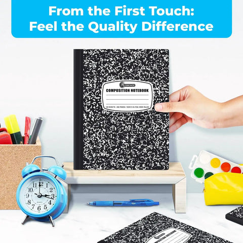 Hand holding one from 100 Pack Wide Ruled Composition Notebooks Bulk 200 Pages Each Hard Cover Black Marble Design