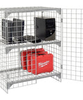 Rock Solid One Tier Two Door Wire Mesh Security Locker Cabinet With Adjustable Shelf Lockable Gray Steel Professional Storage Cage No Sweat Assembly For Garage Shop Workspace with computers and red tool cases.