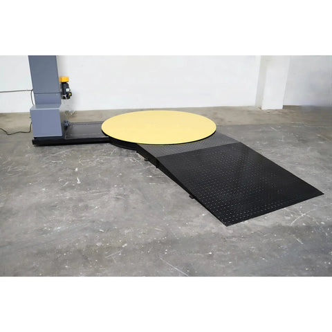 Heavy Duty Industrial Pre Stretch Wrapping Machine With Built In Scale And Thermal Label Printer No Sweat Operation Killer Five Thousand Pound Capacity Straight Shooter Wrap System with yellow turntable and black ramp.