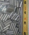 Roll Pins One Eighth By Five Eighths Stainless Steel Pack Of 25 next to ruler for size reference