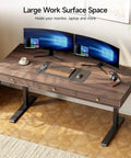 Classic Mid Century Modern Electric Standing Desk 63 Inch with Three Storage Drawers in walnut finish, showcasing dual monitor setup.