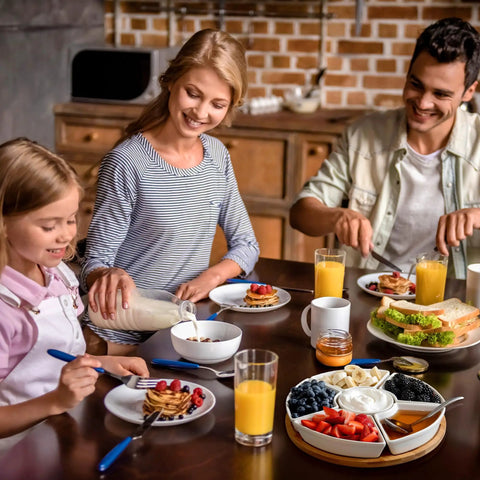 Slick Ceramic Taco Lazy Susan Featuring Six Deep Bowls And A Silky Swivel Base For Enhancing Your Weekly Taco Bar Hosting With Next Level Crew Hangout Vibes Perfect For Tailgate Nights And Backyard Gatherings with family enjoying breakfast