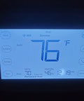 Lakepro-1 Smart Home Thermostat With Wi-Fi And Alexa Compatibility showing temperature and settings on backlit display