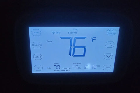 Lakepro-1 Smart Home Thermostat With Wi-Fi And Alexa Compatibility showing temperature and settings on backlit display