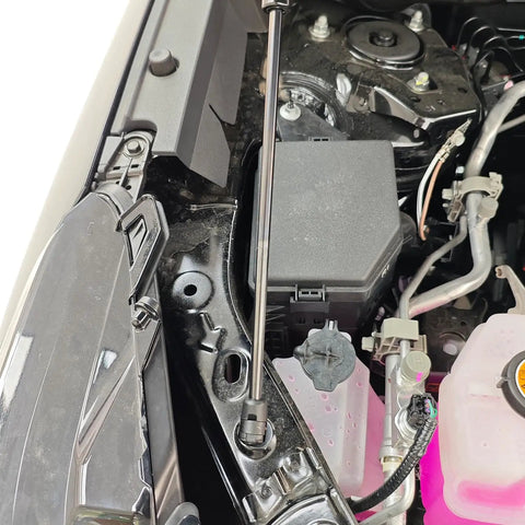 Toyota RAV4 2026 2027 front hood lift supports installed in engine bay, heavy duty stainless steel hydraulic hood struts