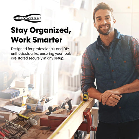 Man standing beside workbench showcasing organized tools for professional and DIY use, promoting effective tool storage.