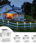 Solar Post Cap Lights For 4x4 And 4x6 Fence Posts, illuminating fence and house exterior with warm 3000K white light