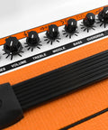 Control panel of Crush PiX CR12L 12W 6-Inch Guitar Amp And Speaker Combo with 3-Band EQ, volume, gain, and overdrive knobs.