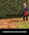 Man using 3-In-1 Leaf Blower Vacuum Mulcher With Backpack Design For Yard Cleanup, Corded Electric Power, Up To 260 MPH And 450 CFM, 12 Amp