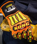 Person wearing Mens Cut Resistant Work Gloves With TPR Finger Coverage And High Grip PVC Dotted Palm Level 5 Abrasion Neoprene Slip Cuff For Snug Fit Orange Safety Hand Protection For Construction And Warehouse Jobs holding a yellow power tool.