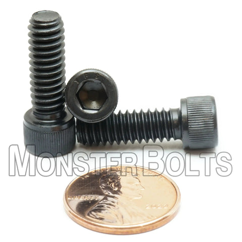 One Hundred Pack 1/4 20 By 3/4 Inch Socket Head Cap Screws Crafted From Top Shelf Alloy Steel With A Durable Thermal Black Oxide Finish Built Tough And Hella Rugged For Straight Up Pro Mechanic Jobs with a penny for size comparison.