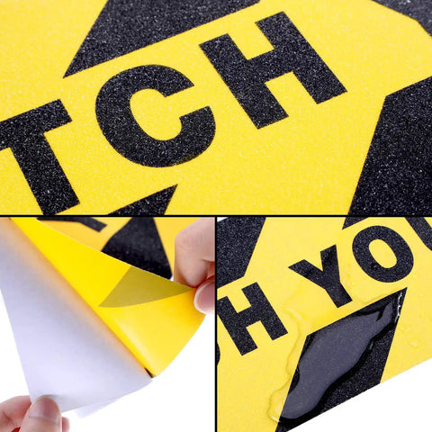 Close-up of Two Pack Watch Your Step Floor Stickers Anti Slip Safety Decal 6X24 Inch showing texture and peel-off backing.