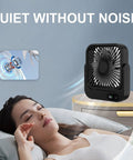 Magnetic Travel Fan With Five Adjustable Speeds Cruise Ship Approved Battery Powered Personal Cooler positioned quietly beside a relaxed user.