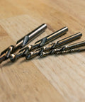 5-piece left hand drill bit for metal working with cobalt M35 steel split point tips self centering built to cut through hardened metals