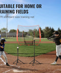 Two players using 7x7 Ft Baseball And Softball Practice Net Portable Training Net For Hitting Batting Catching And Pitching Backstop