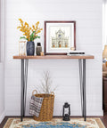Heavy Duty 36 Inch Hairpin Table Legs Set Of Four Half Inch Steel Rods Black Powder Coat 800 Lb Load Capacity Mid Century Modern Style For Coffee Tables End Tables Night Stands supporting a wooden tabletop with decor