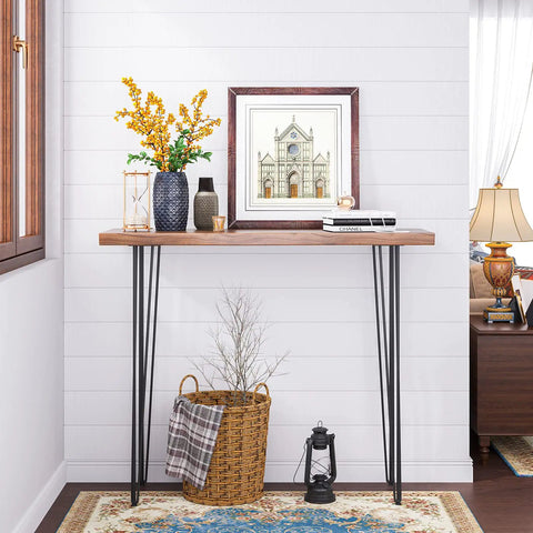 Heavy Duty 36 Inch Hairpin Table Legs Set Of Four Half Inch Steel Rods Black Powder Coat 800 Lb Load Capacity Mid Century Modern Style For Coffee Tables End Tables Night Stands supporting a wooden tabletop with decor