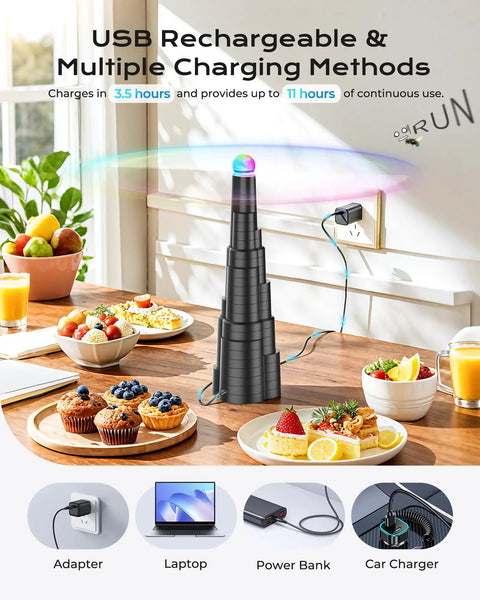 Tabletop Fly Fans With USB Type C Rechargeable Battery And Colorful LED Light Show on dining table with food, plugged in charger