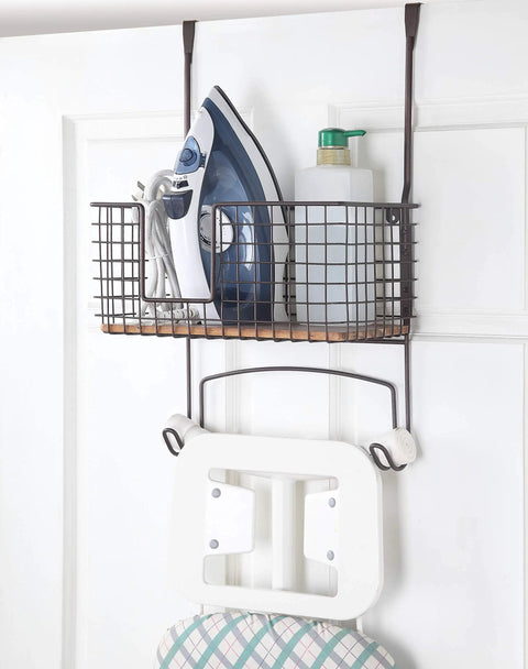 Metal Over The Door Or Wall Mount Ironing Board Holder With Large Storage Basket, ironing supplies and board shown.