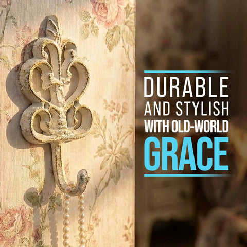 Distressed White Cast Iron Wall Hooks Set Of Three Dang Sturdy Farmhouse Coat Rack for hanging jewelry on floral wallpaper.