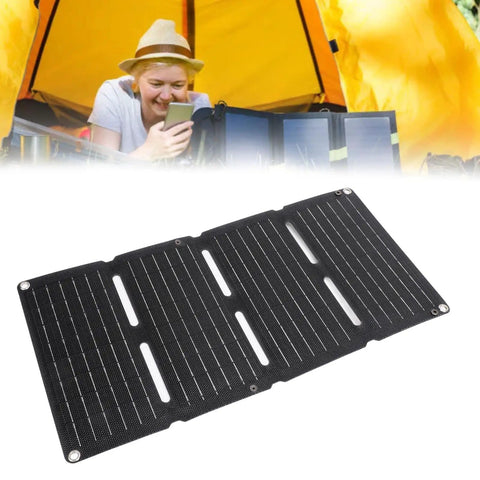 80W Folding Solar Panel With Monocrystalline Cells Grab And Go Portable Solar Charger shown in front of a camper