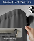 Person adjusting matte blackout curtain rod with wrap around design, blocks light effectively, smooth operation shown in close-up.