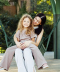 Mother and daughter sitting on Hanging Hammock Chair For Patio With Plush Headrest And Armrests Outdoor Swing Seat With Cup Holders