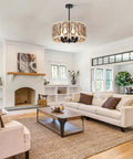 23-Inch 7-Light Rustic Wood Drum Chandelier With Metal Accents in cozy living room with white sofa and fireplace