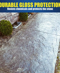Heavy Duty Super Wet Look Stone And Concrete Sealer One Gallon applied on stone walkway showing durable glossy finish.