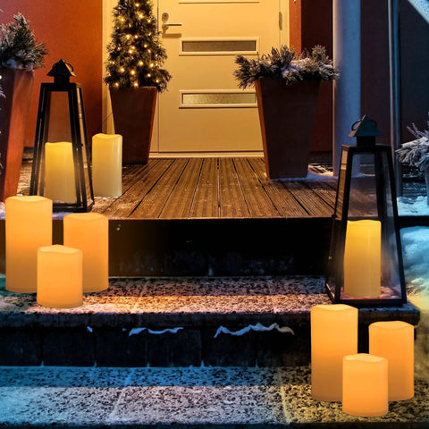 Waterproof Outdoor Flameless Pillar Candles 10x5 Inch Battery Operated LED With Remote And Timer Flickering Ivory White on steps
