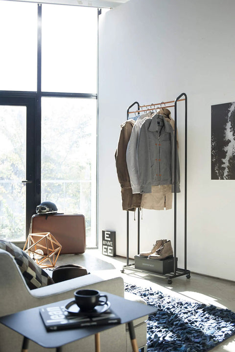 Kickass Rolling Wardrobe Rack With Staggered Wooden Bars And Roomy Bottom Shelf Built Tough With Steel Frames Delivers The Ultimate Flex For Portable Closet Setup Anywhere Glides On Smooth Casters