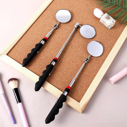 Six Piece Telescoping Inspection Mirror Set With Retractable Long Handles Extendable Up To 29 Inches on a corkboard