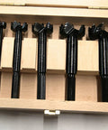 Top Shelf Five Piece Forstner Drill Bit Set With 15 mm Through 35 mm Hole Cutters Tough As Nails Steel Build in a wooden box.