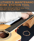 Pro Grade Guitar Setup Tool Kit For DIY Luthiers With Neck Rest Cradle in use on acoustic guitar