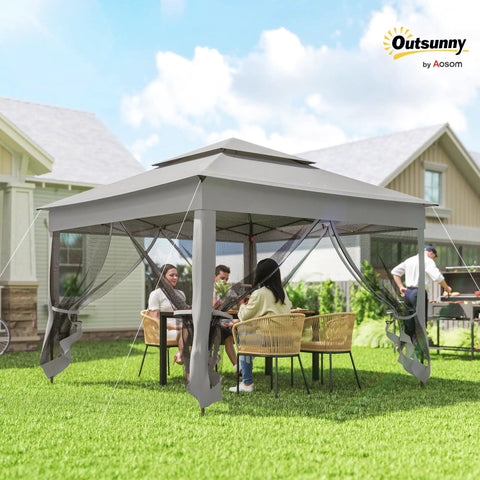11 By 11 Pop Up Canopy With Screen Walls For Outdoor Use in backyard with people seated inside, light gray, easy setup