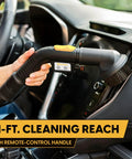 Professional Grade Wet Dry Upholstery Shampoo Vacuum Featuring Remote Control Handle And Six Gallon Tank For Autos Carpets And Furniture Bad Ass Dirt Hog Rig uses a remote handle in a car interior.
