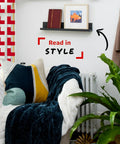 Damage Free Picture Ledge 21 Inch Floating Shelf With Adhesive Strips No Tools Needed Holds Photos And Decorations Up To 5 Pounds Slate Finish Includes 1 Ledge And 10 Strips displaying decor in a modern living room