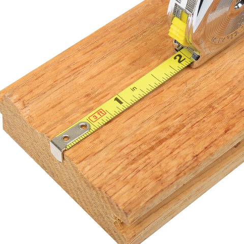 PowerLock Key Tape Measure 3 By 1 Quarter Inch Blade With Polymer Coated For Rust Resistance on a wooden surface