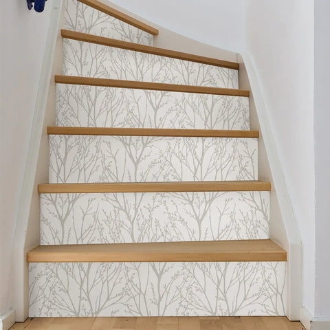 Stairs decorated with Treetops Peel And Stick Wallpaper In White And Off White, Removable Wall Covering For Easy DIY Decor.